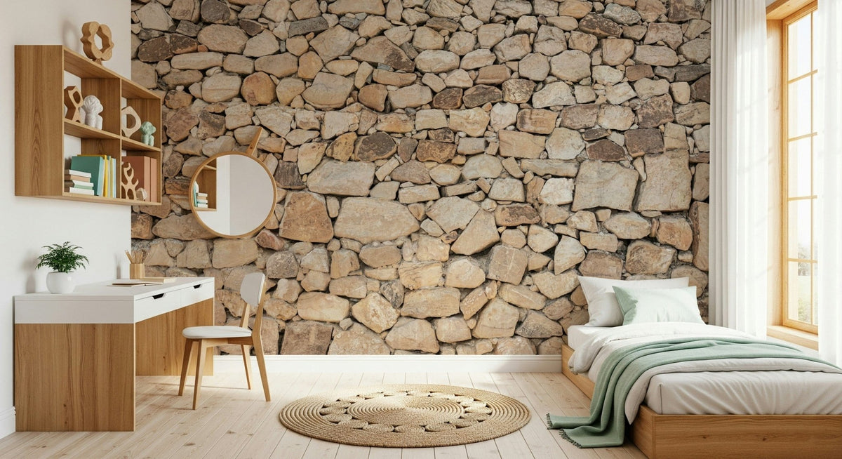 Timeless Stonework wallpaper mural in tan fieldstone behind a single wood bed and white desk in a kids bedroom