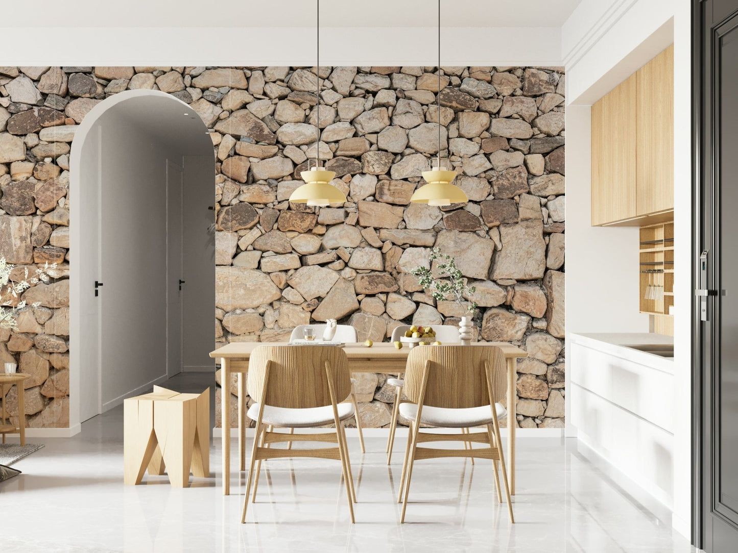 Timeless Stonework wallpaper mural of tan fieldstone behind a wood dining table and chairs near an arched doorway
