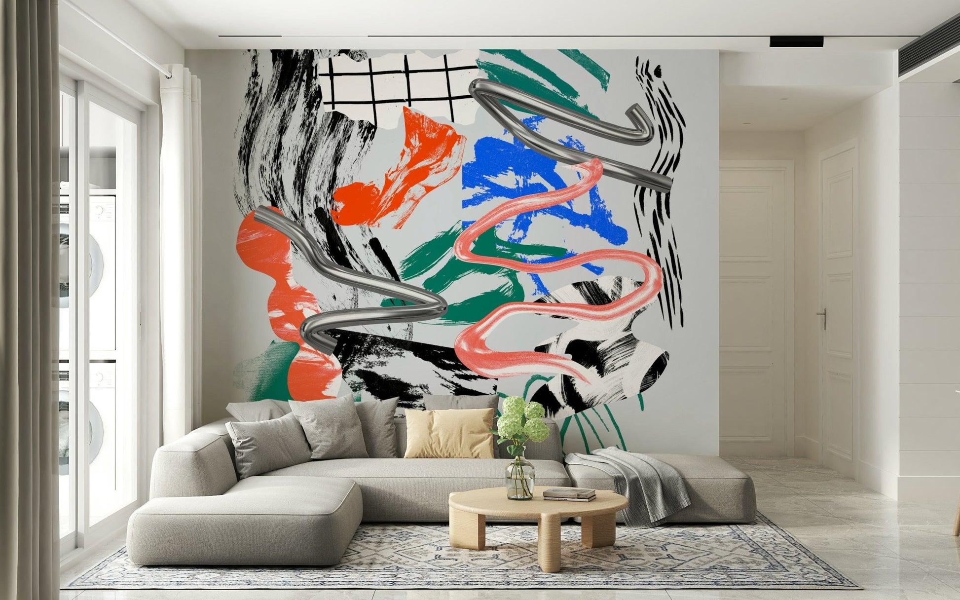 Tornado wall mural with chrome swirls and pink ribbon over colorful brushstrokes behind a gray sectional sofa in a living room