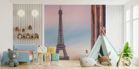 Tour Eiffel Sunset wallpaper mural of the pink tower in a kids room with a toddler bed, teddy bears and teepee