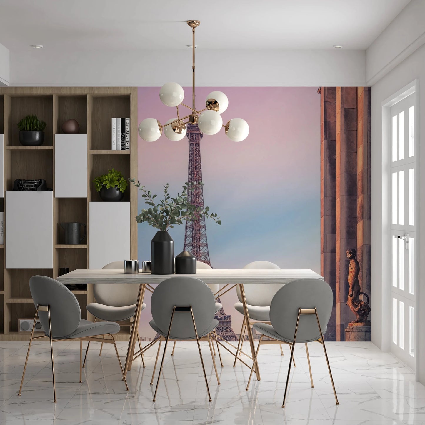 Tour Eiffel Sunset wallpaper mural of the tower against pastel sky in a dining room with grey chairs and gold chandelier