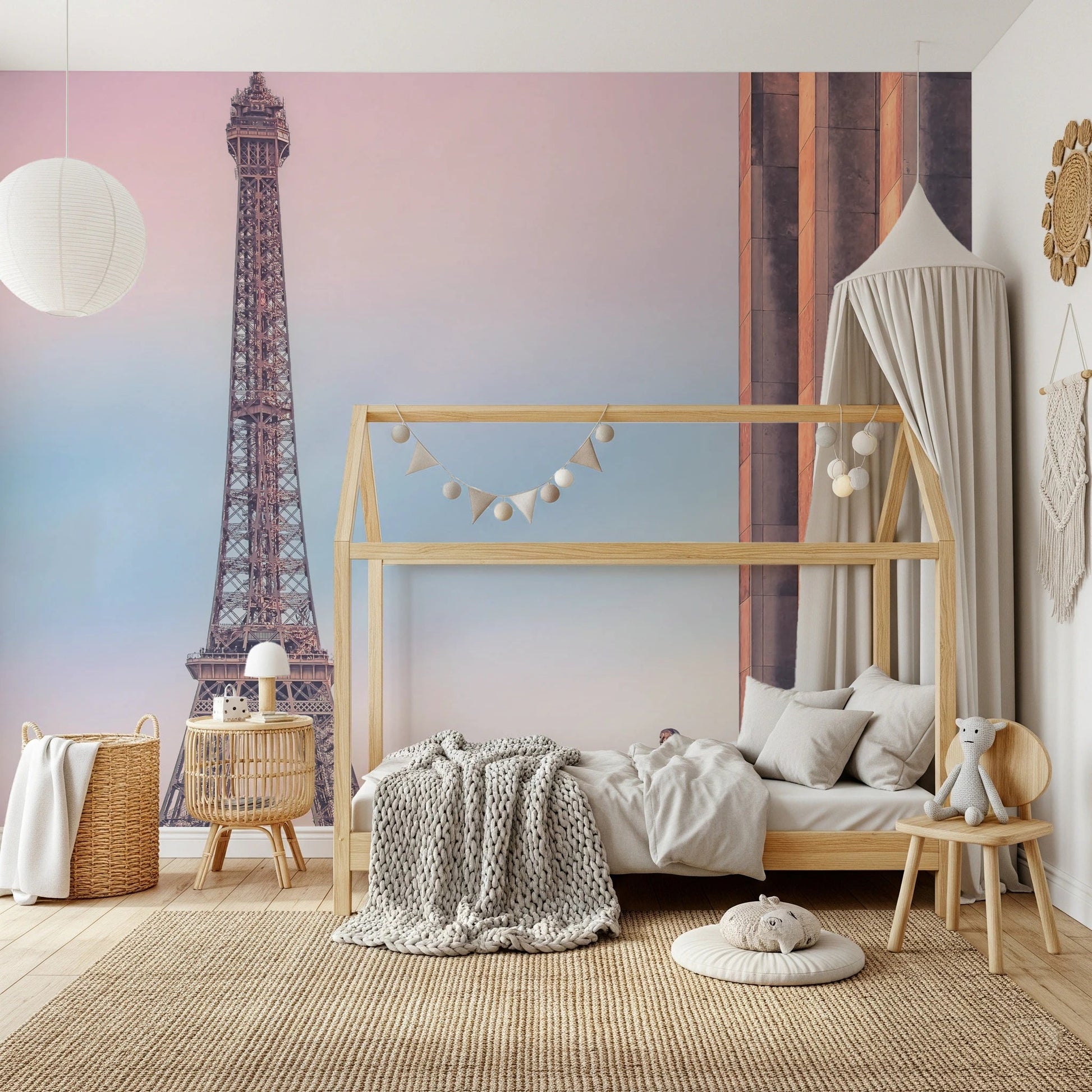 Tour Eiffel Sunset wallpaper mural of the pastel Eiffel Tower in a kids room with a house-frame bed and canopy