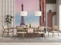 Tour Eiffel Sunset wallpaper mural of the Eiffel Tower in pink dusk sky in a dining room with cane chairs