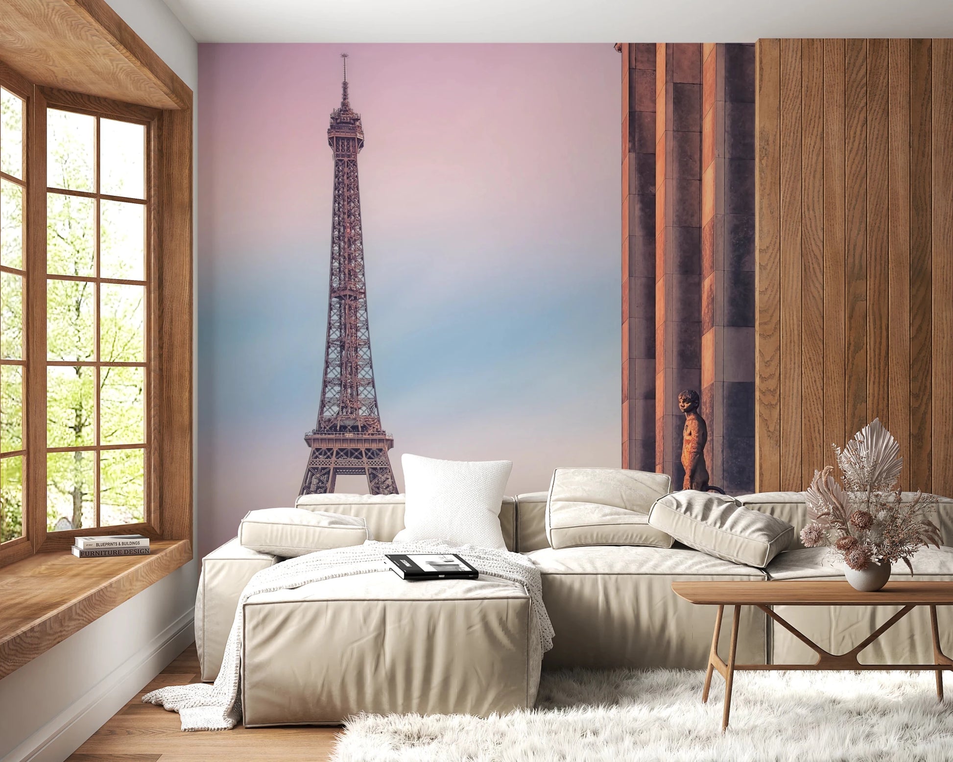 Tour Eiffel Sunset wallpaper mural of the tower in pink sky behind a cream sectional sofa by a window seat