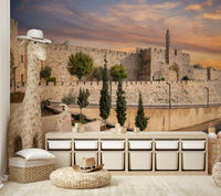 A prominent stone tower is visible.

