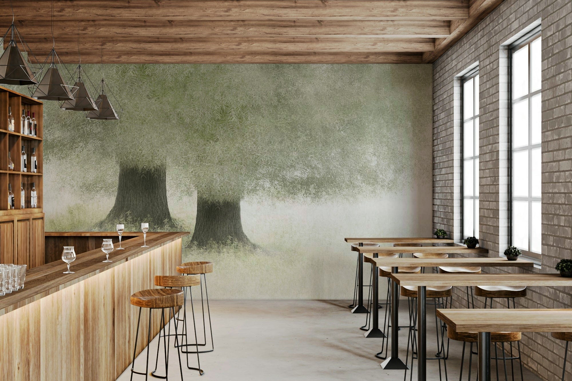 Verdant Veil wallpaper mural of misty green trees behind a wooden bar counter and stools in a cafe with brick walls