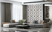 Modern geometric wall mural with layered triangles in deep brown and warm neutral shades.