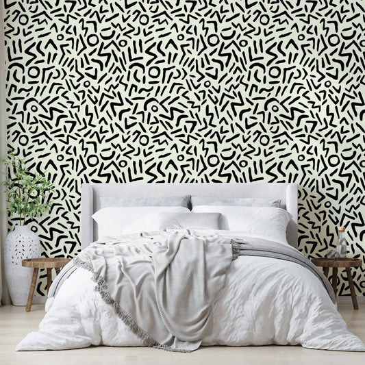 Black ink doodle wallpaper with geometric tribal shapes
