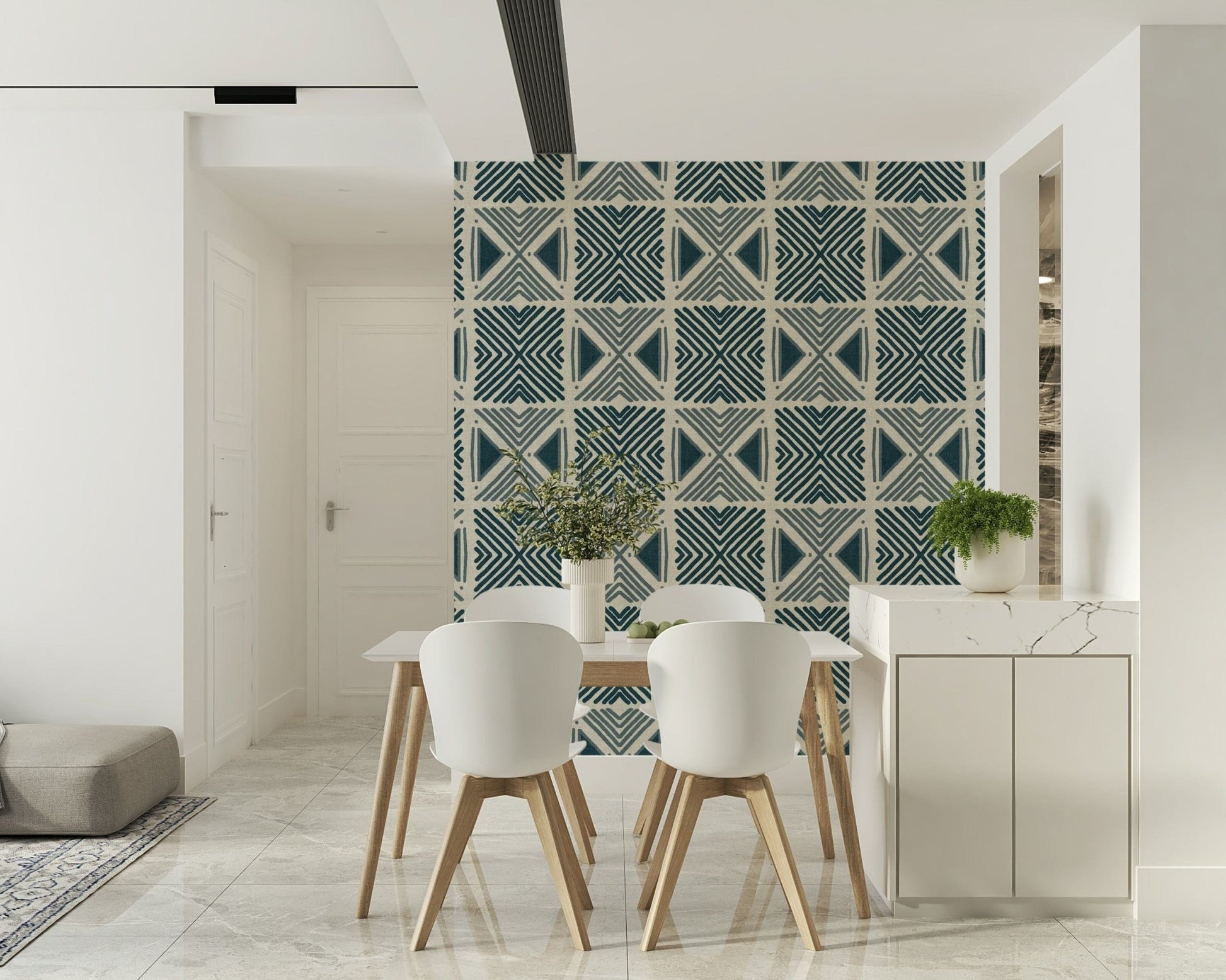 Indigo pattern mural for a nursery with white wooden furniture and neutral tones.