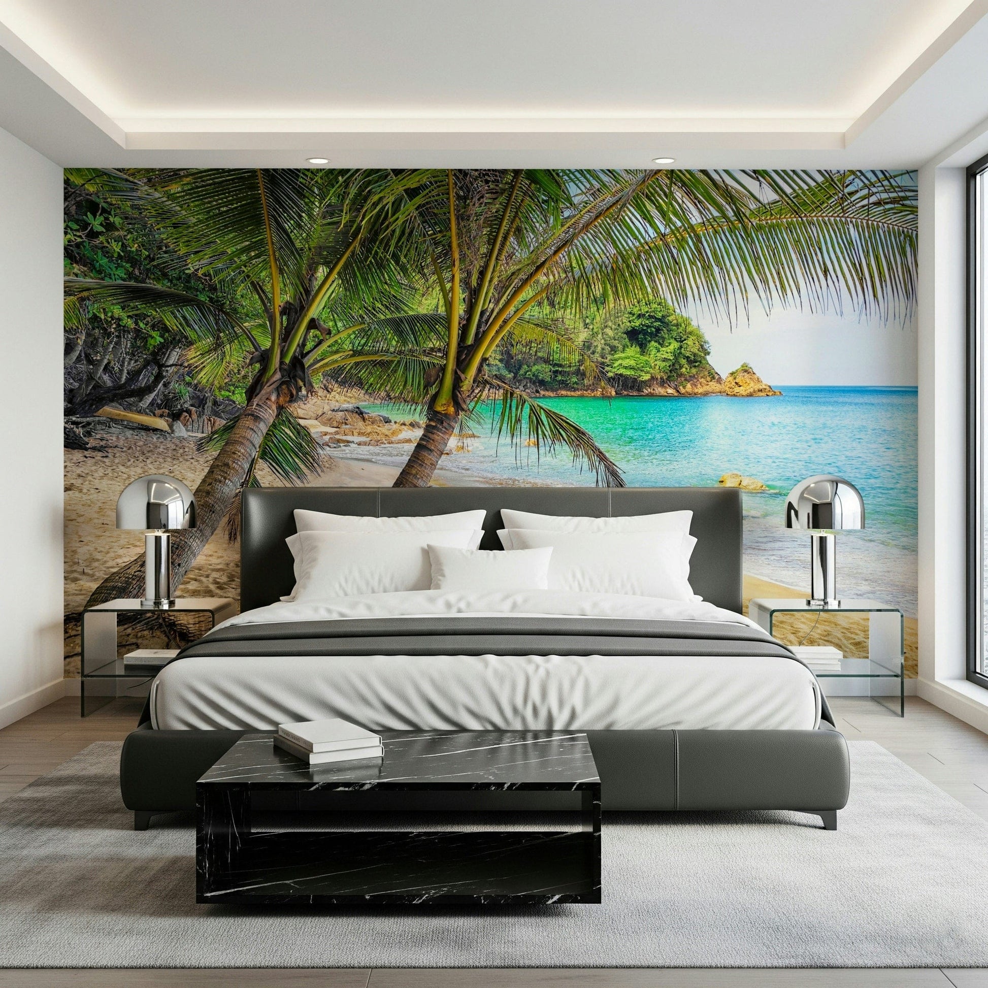 Tropical Beach Escape wallpaper mural of leaning palms over a turquoise cove behind a dark grey bed in a bedroom