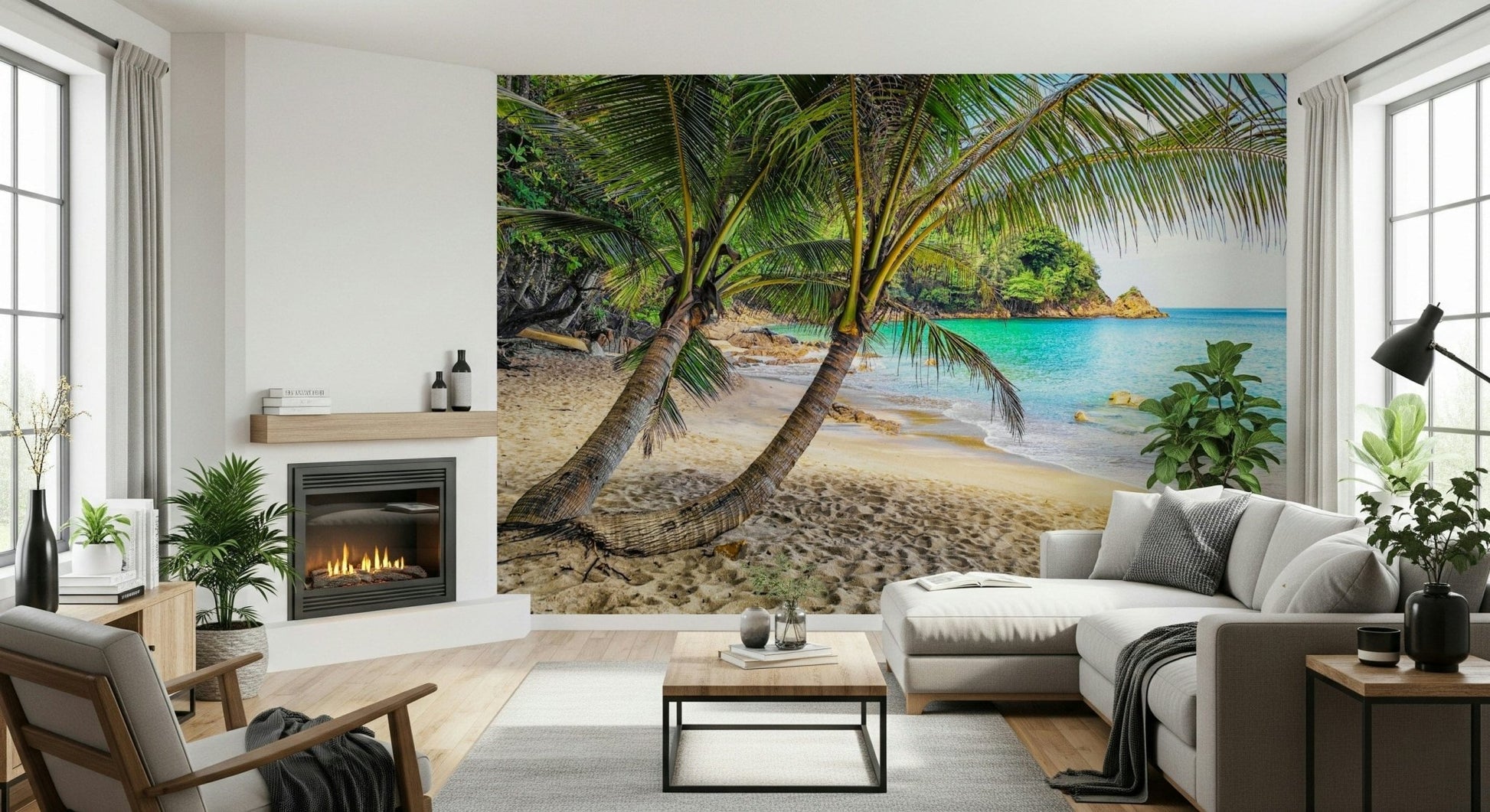 Tropical Beach Escape wallpaper mural of a turquoise cove behind a white sectional and lit fireplace in a living room