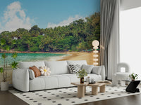 Coastal wall mural displaying lush greenery, clear water, and natural sky clouds