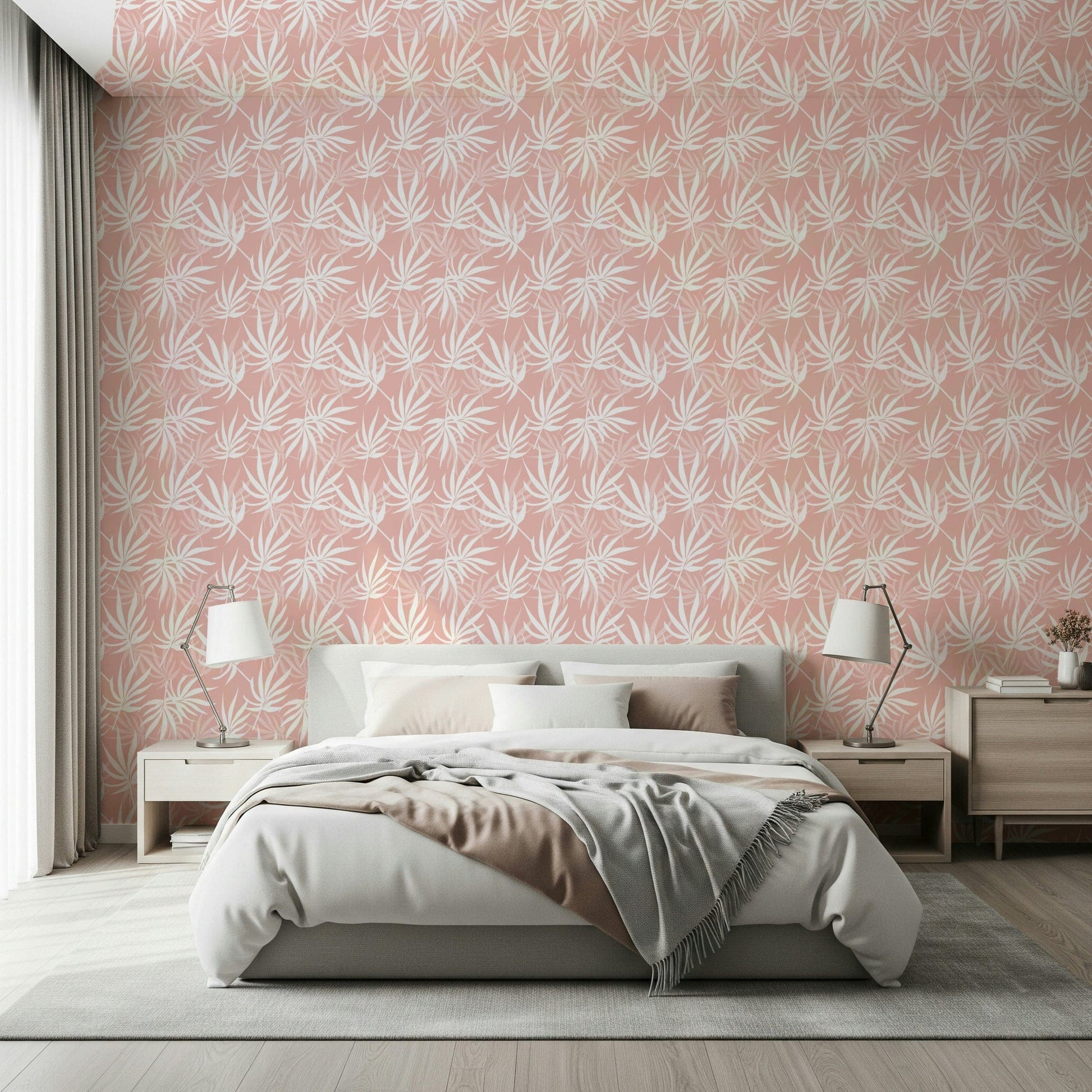 Blush leaf wallpaper above cozy bed setup