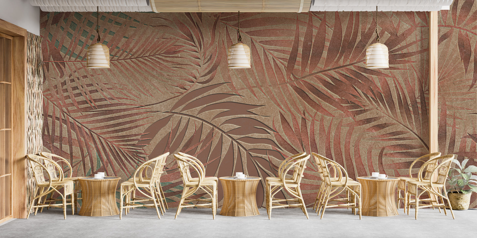 Tropical Copper Leaves wallpaper mural in copper palm fronds above rows of rattan chairs and tables in a cafe area
