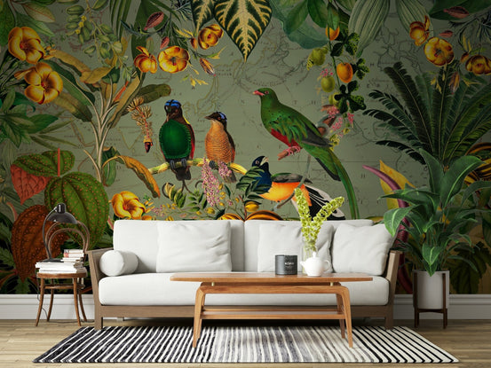 Tropical Explorers' Chart mural of birds and yellow blooms behind a white sofa and wood coffee table