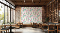 Wallpaper with flamingos among tropical plants and pink accents.

