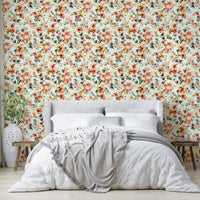 Wallpaper with tropical flowers and green jungle leaves

