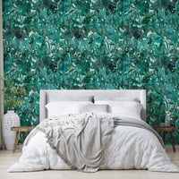 An angled shot of a wall with green wallpaper

