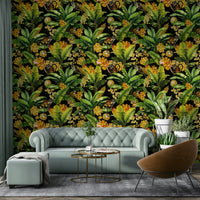 Wallpaper with monkeys, flowers, and large tropical leaves in bold colors.


