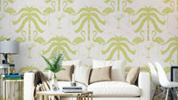 A wall mural of a tropical palm and flamingo pattern.

