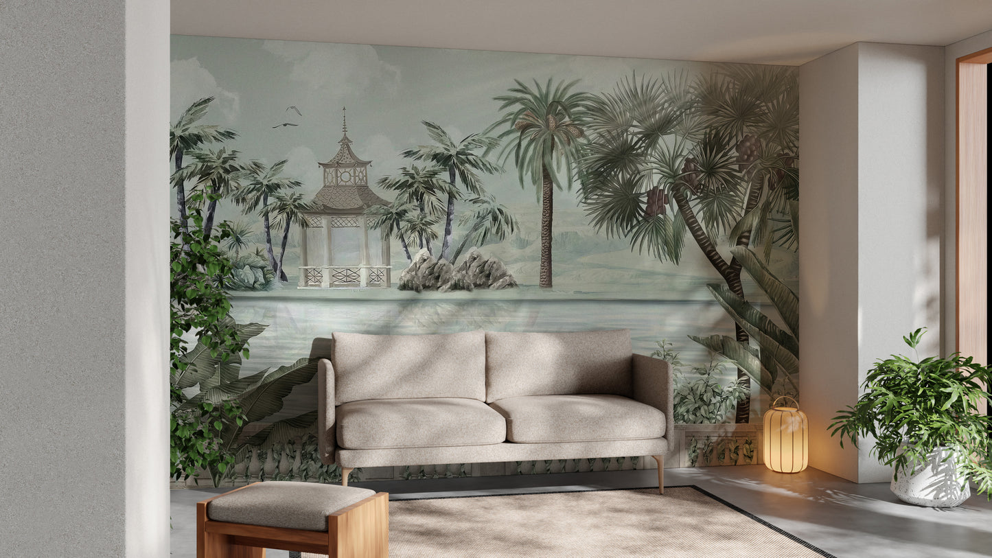 Watercolor Tropical Riverbank wallpaper mural styled as a feature wall behind a dining table and chairs in green tones