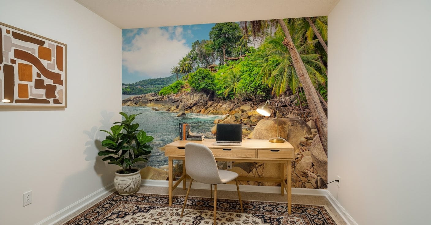 Tropical Shores wallpaper mural of a palm coastline behind a wood desk and laptop in a small home office