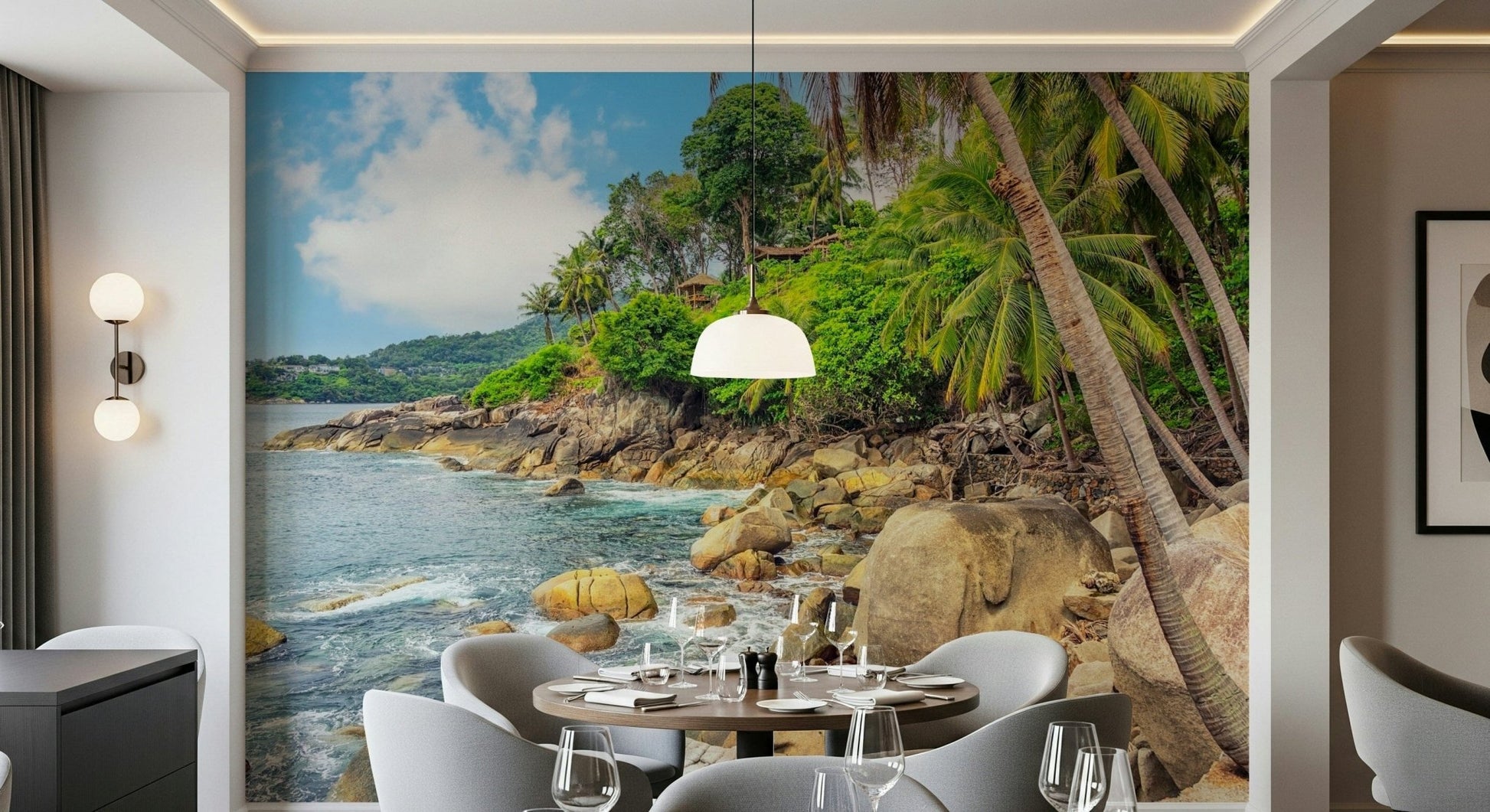 Tropical Shores wallpaper mural of a sunny tropical coast behind a round dining table set for a meal in a dining room