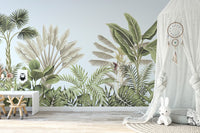 Vintage Tropical Leaves wallpaper mural as a feature wall in a home office workspace in green tones