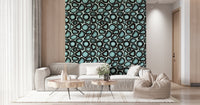 A textured wallpaper showcasing swirling turquoise geode shapes for a natural stone aesthetic.