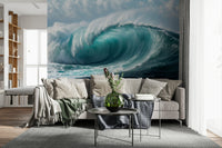 Turquoise Surge wallpaper mural of a curling ocean wave behind a beige sectional sofa in a living room