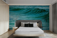 An artistic coastal scene mural on minimalist wallpaper.

