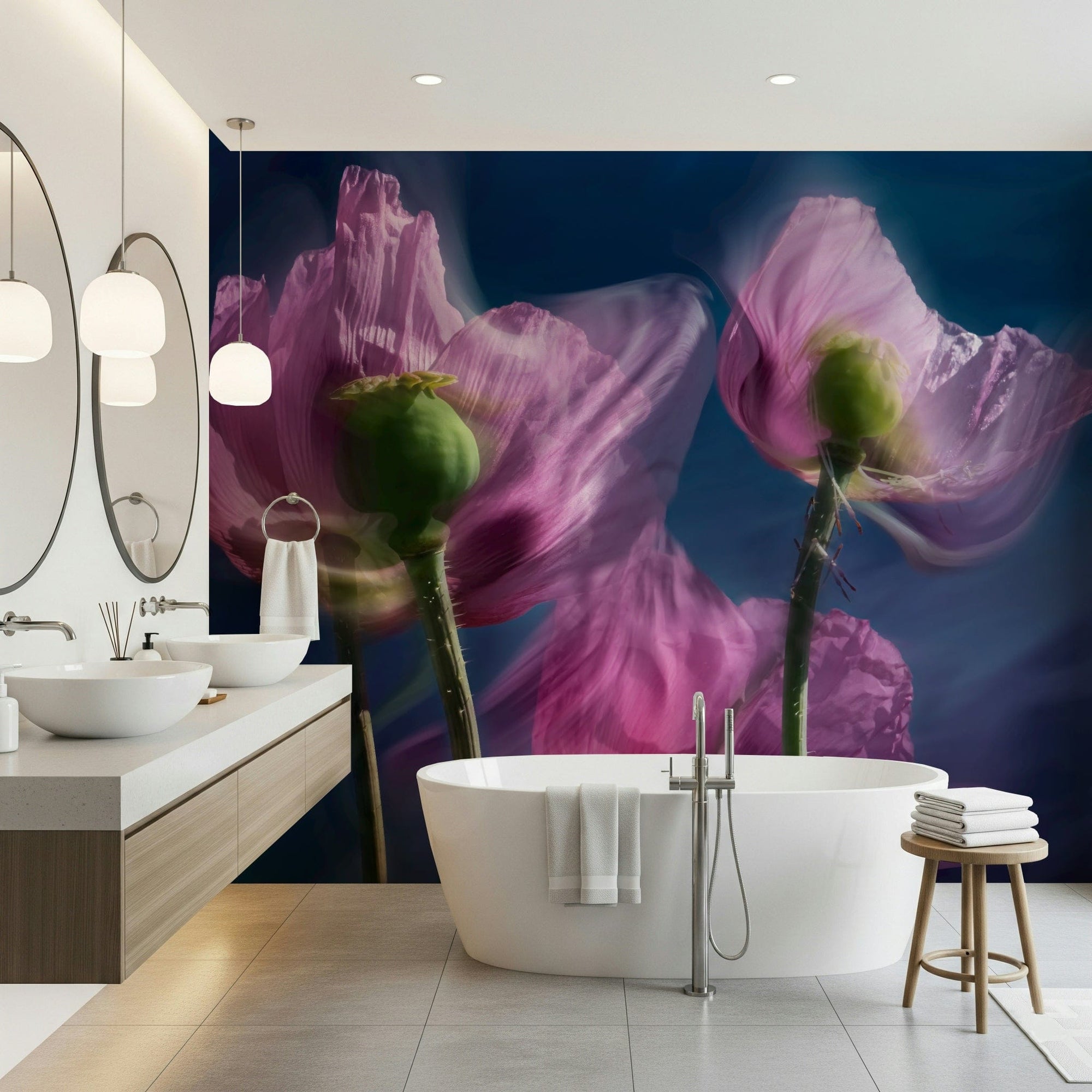 Twilight Poppies mural of pink poppies on deep blue behind a white freestanding tub and wood vanity in a bathroom