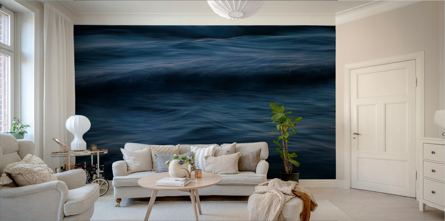 A bedroom with the wall mural behind the headboard.

