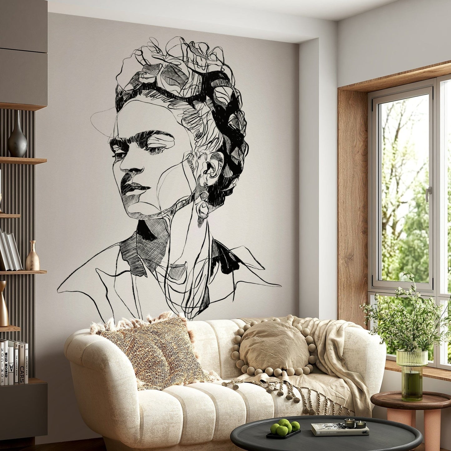 Unbroken wallpaper mural with a line-drawn woman's portrait above a cream boucle sofa in a living room