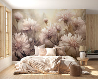 Underwater Pink Flowers wallpaper mural with dreamy pink florals behind a bed dressed in a chunky knit throw and pillows