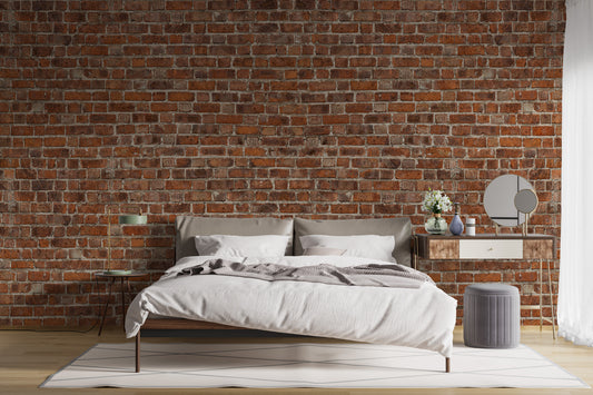 Red Brick Grunge wallpaper mural styled as a living room feature wall behind a sofa and seating in red tones