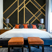 Art Deco black mural wallpaper with symmetrical design.

