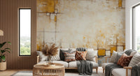 Urban Blocks wallpaper mural with yellow and beige textured blocks behind a white sofa and loveseat with boho pillows