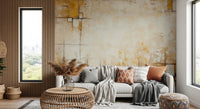 Urban Blocks wallpaper mural of warm gold and cream plaster squares behind a white sofa by a wood-slat wall in a living room