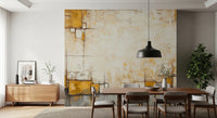 Urban Blocks wallpaper mural with mustard and ivory textured blocks above a wood dining table and chairs in a dining room