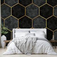 Hexagon pattern wall mural in charcoal with elegant golden accents.

