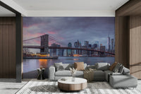 The sky is a mix of deep blue, orange, and purple.

