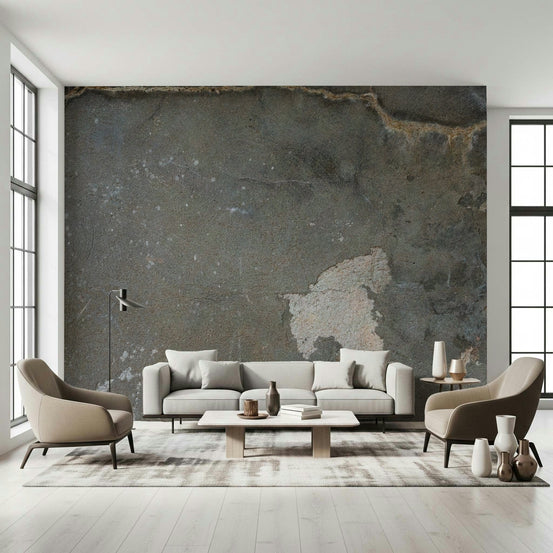 Urban Gray Industrial wallpaper mural in charcoal concrete behind a gray sofa and two taupe armchairs