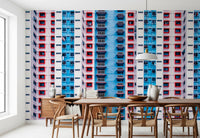 Urban Gridlock wallpaper mural of a dense building facade in a dining room with wood wishbone chairs