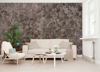 Textured wall mural with grunge-inspired patterns creating a bold, industrial-style accent wall.