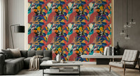 Urban Muse wallpaper behind a dark grey sectional with glass orb pendants in a living room