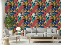 Urban Muse wallpaper of a pop-art floral face collage behind a grey sofa in a living room