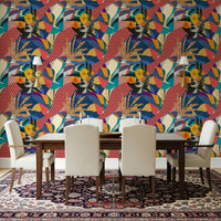 Urban Muse wallpaper behind a dark wood dining table with cream chairs and a Persian rug