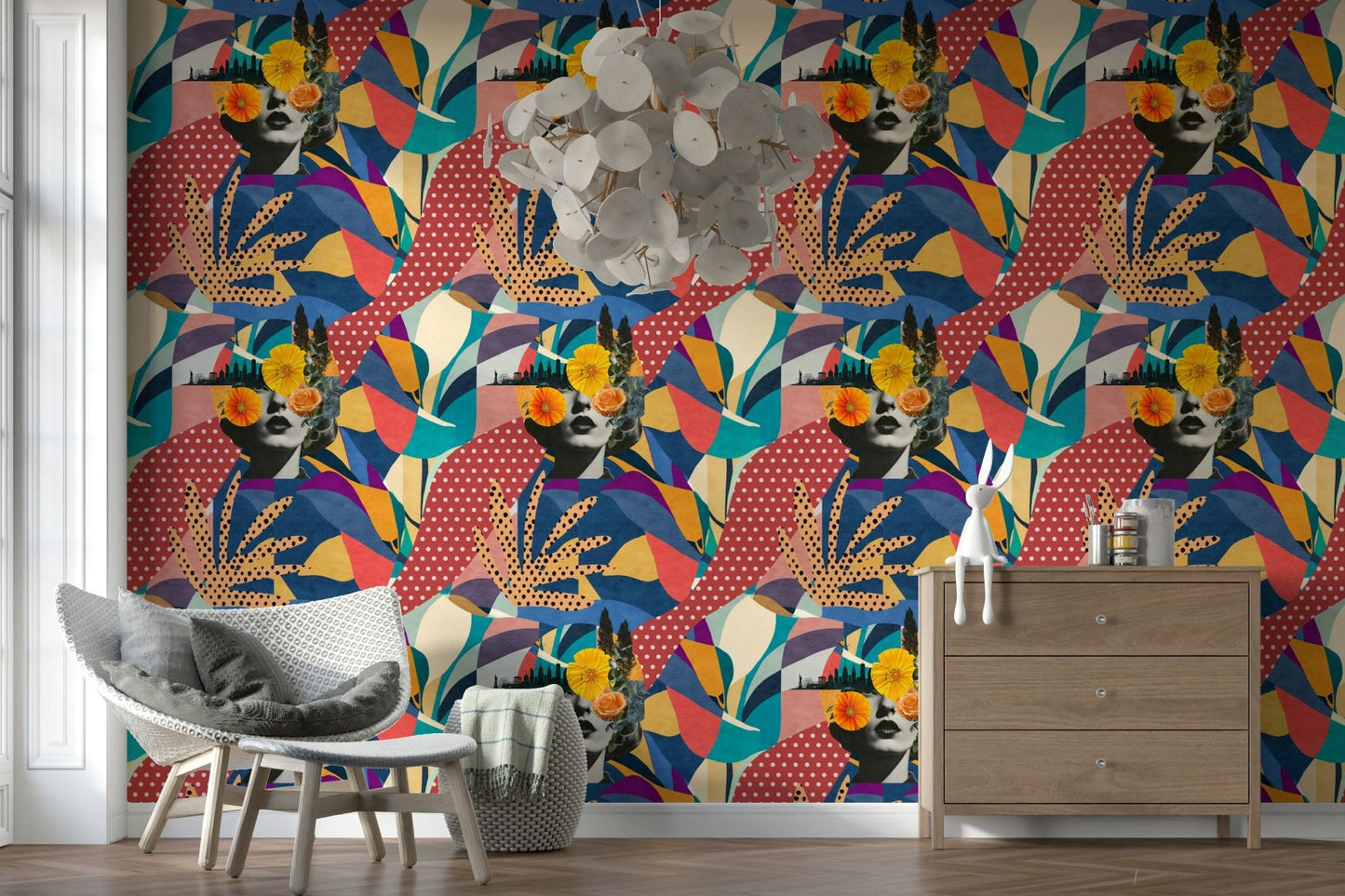 Urban Muse wallpaper in a nursery with a white egg chair, wood dresser and capiz chandelier