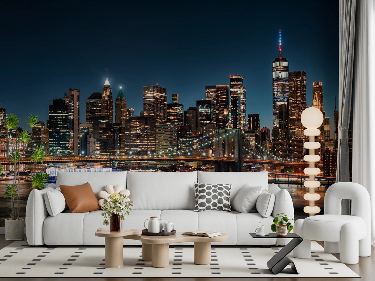Urban Nightscape wallpaper mural of a glowing New York skyline above a white sofa in a bright living room